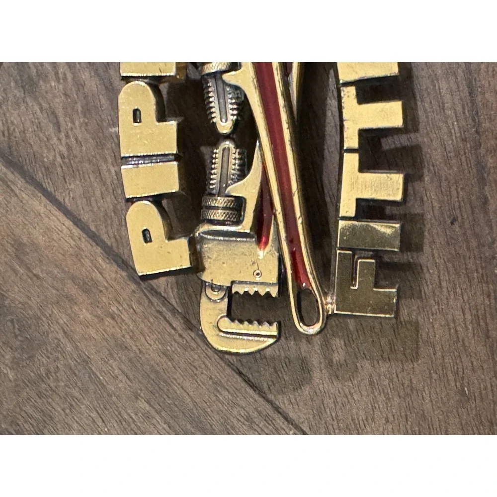 Vintage Pipefitter‎ 1990 Belt Buckle Gold tone Red Embellishment Tools